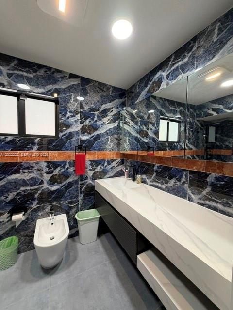 20465 Southwest 200th Street Miami, FL 33187 - Photo 24 of 36 a bathroom with a sink a toilet and shower