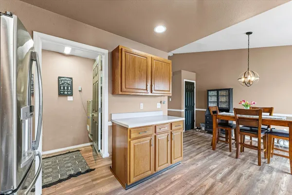 a view of a kitchen and dining room