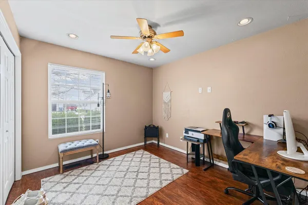 a workspace with furniture and window