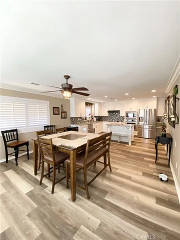 a living room with lots of furniture and a table
