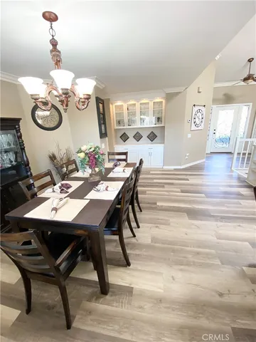 a view of a dining room and a table