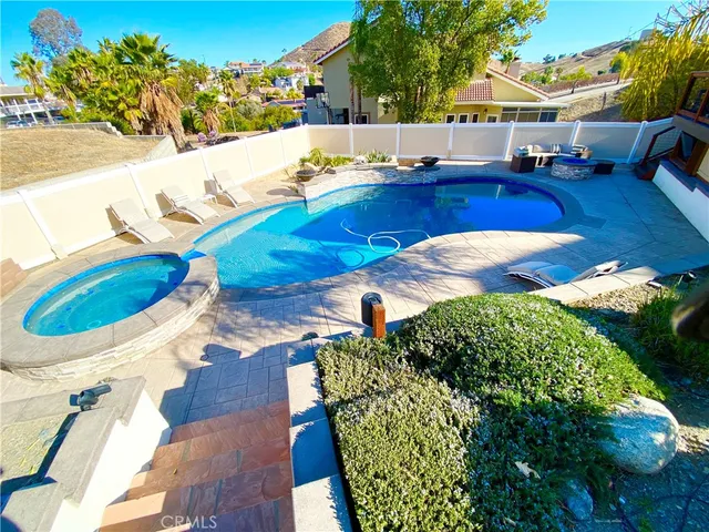 a view of yard from deck having outdoor seating