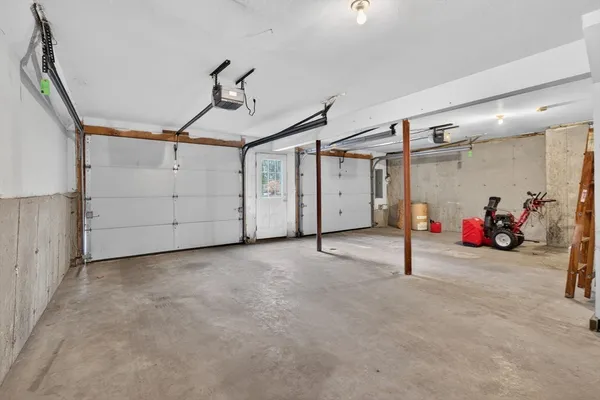 an aerial view of a house with outdoor space