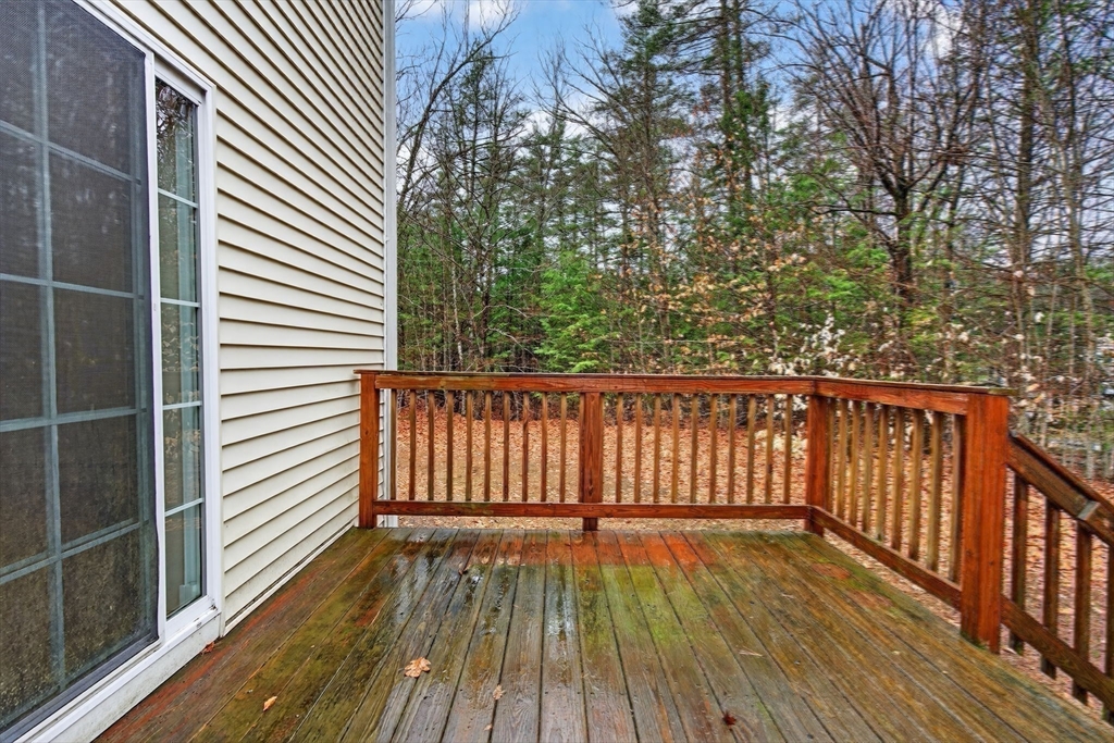 15 Scribner Road Fremont, NH 03044 - Photo 40 of 42 a view of a wooden balcony