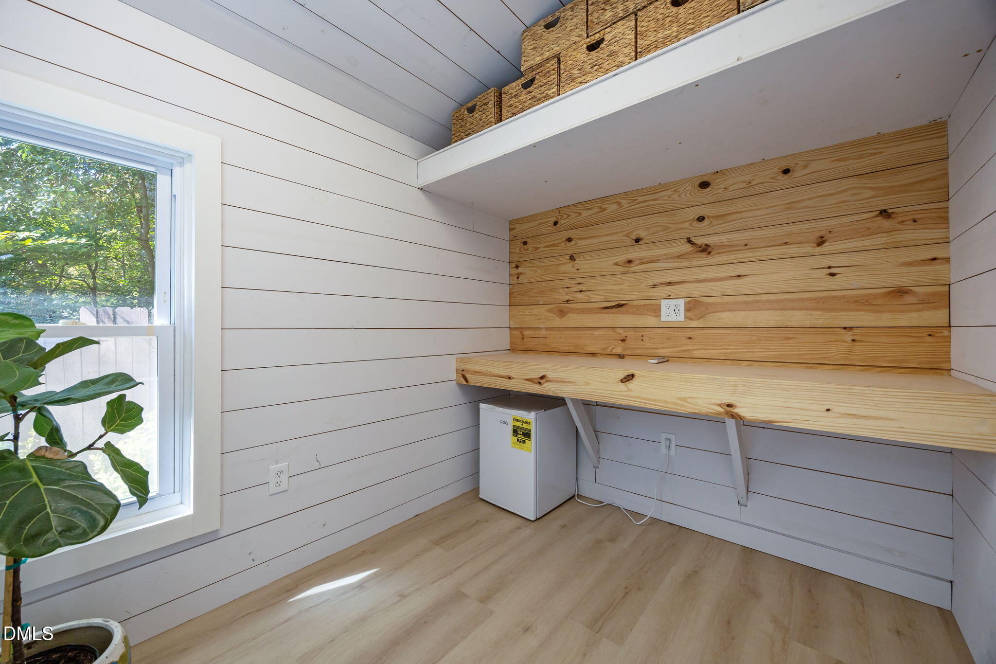 1024 Mockingbird Drive Raleigh, NC 27615 - Photo 26 of 31 a view of outdoor space and wooden shelves