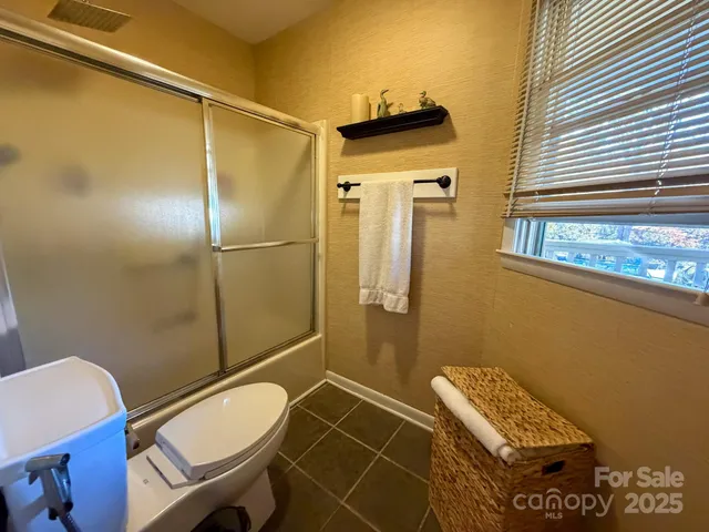 a view of a mountain in the distance in a field