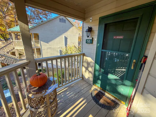 a view of building with a balcony