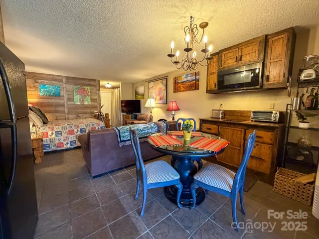 a bedroom with a bed and tv