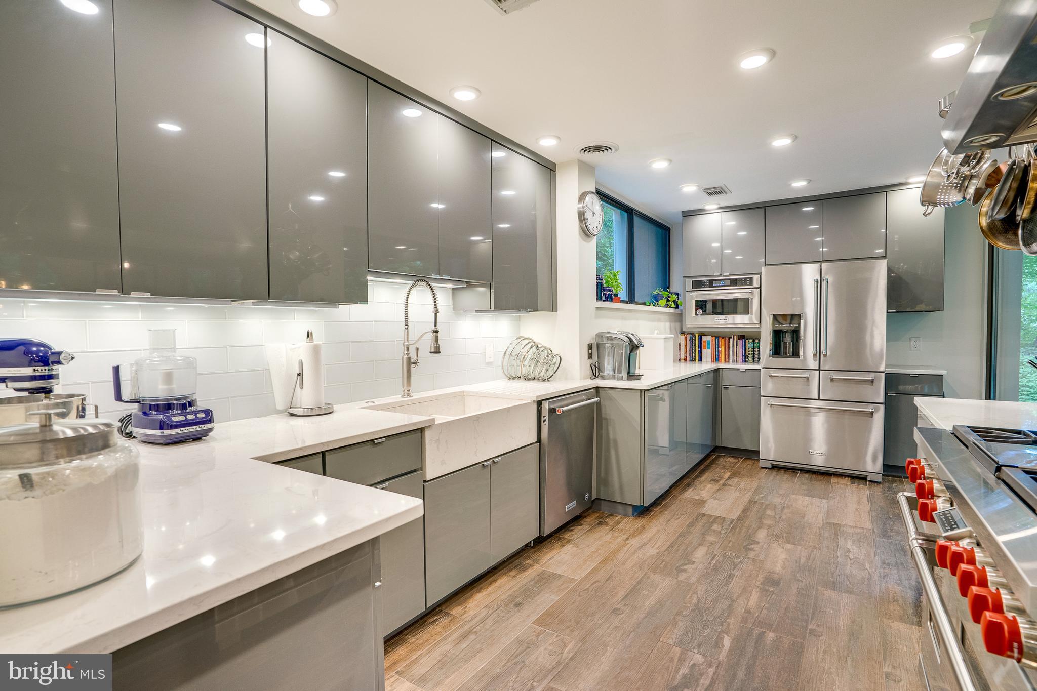 11405 Purple Beech Drive Reston, VA 20191 - Photo 17 of 72 a kitchen with a sink appliances and cabinets