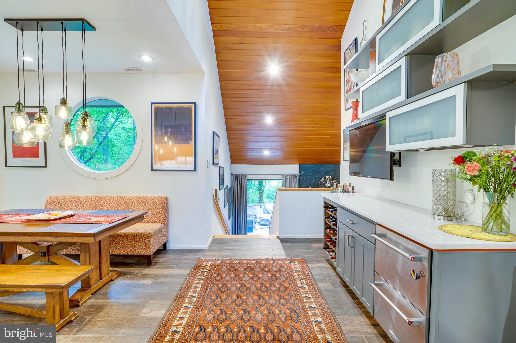 11405 Purple Beech Drive Reston, VA 20191 - Photo 24 of 72 a bathroom with a sink a mirror and a shower