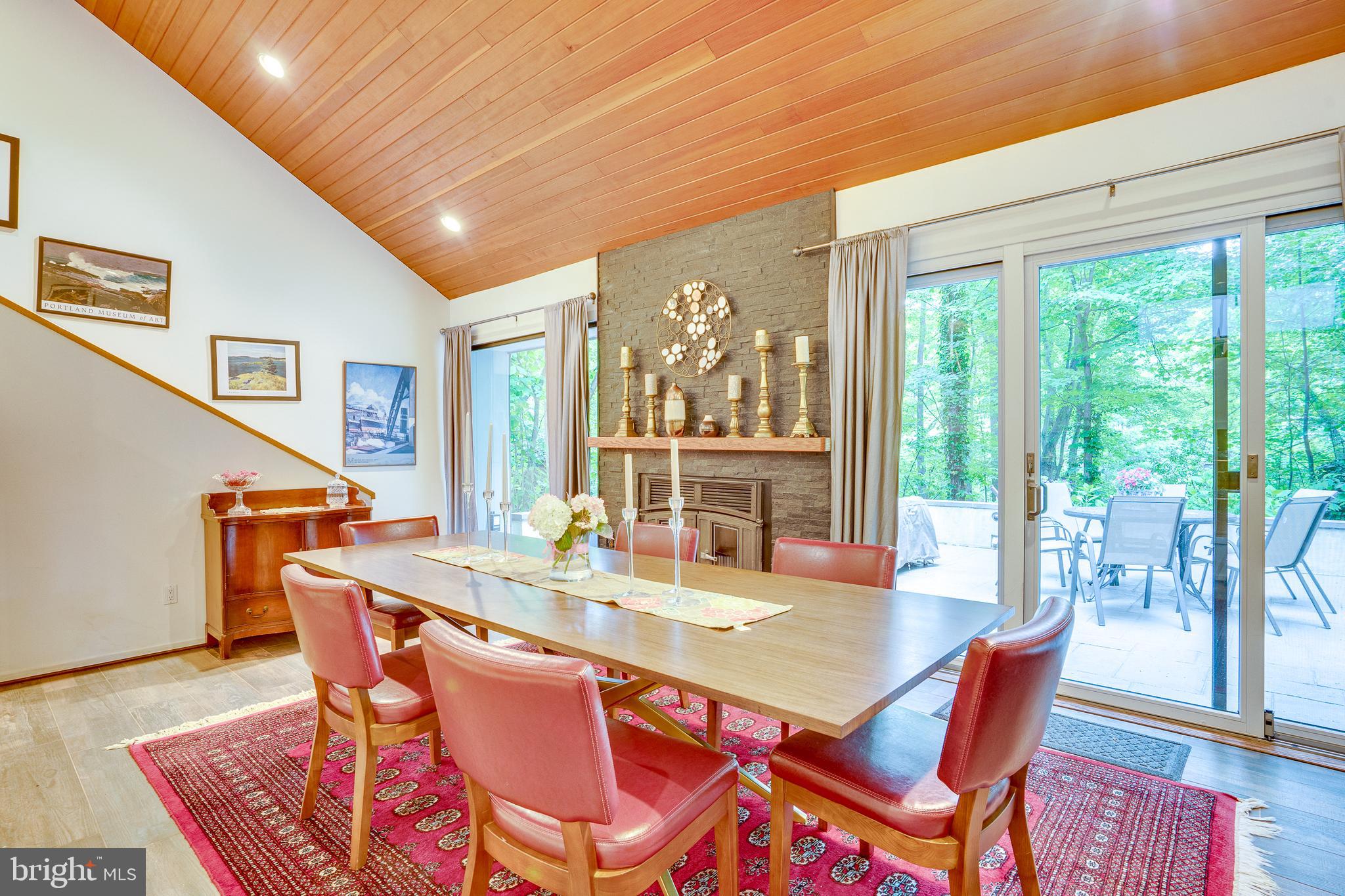 11405 Purple Beech Drive Reston, VA 20191 - Photo 28 of 72 a dining room with furniture a chandelier and wooden floor