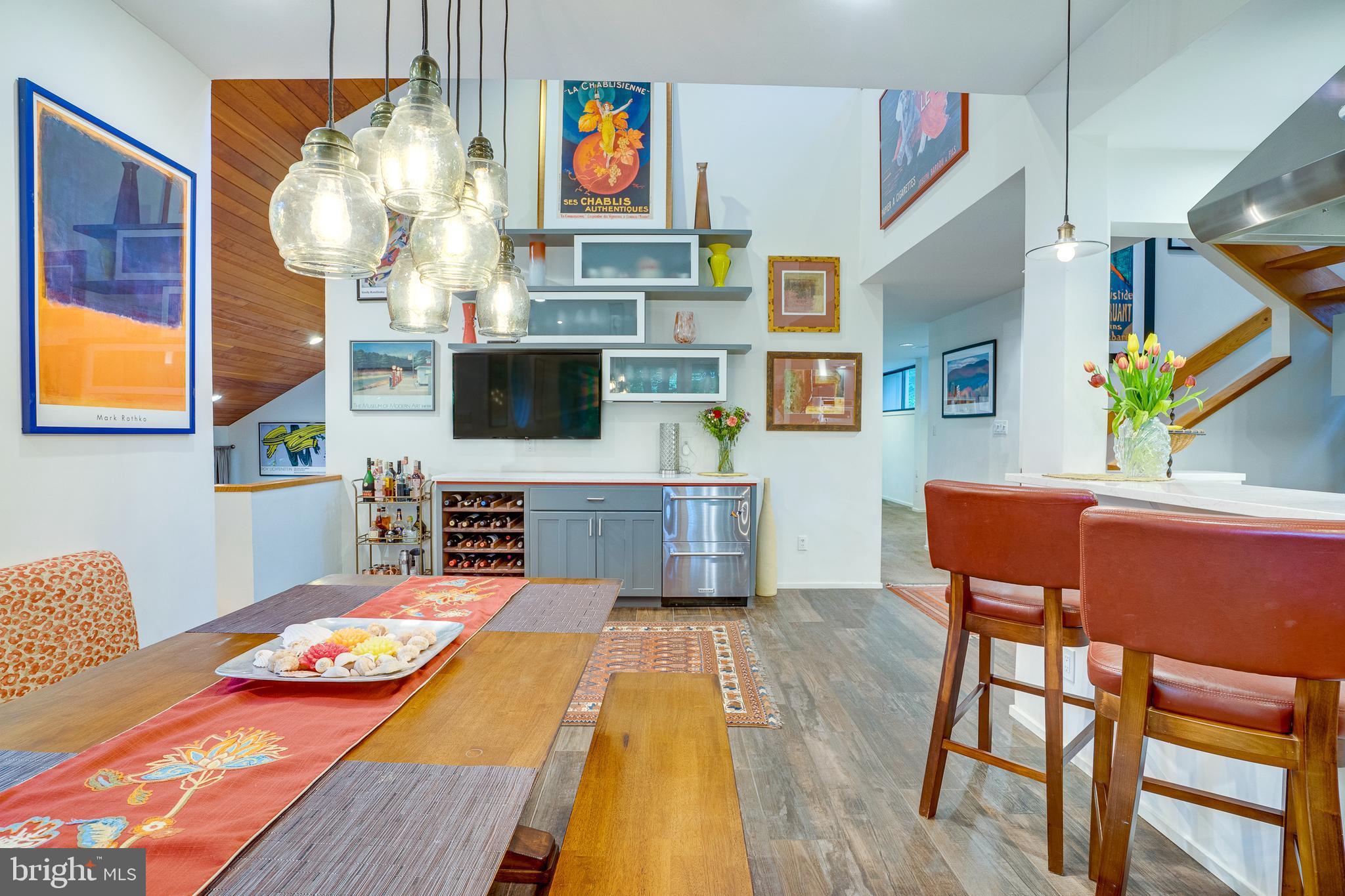 11405 Purple Beech Drive Reston, VA 20191 - Photo 30 of 72 a living room with furniture and a flat screen tv