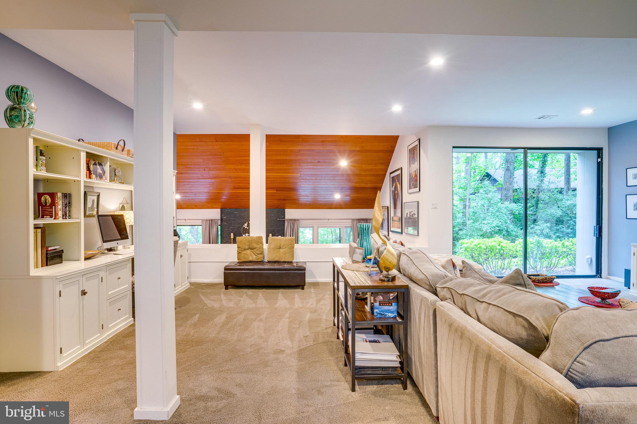 11405 Purple Beech Drive Reston, VA 20191 - Photo 33 of 72 a living room with furniture and large windows