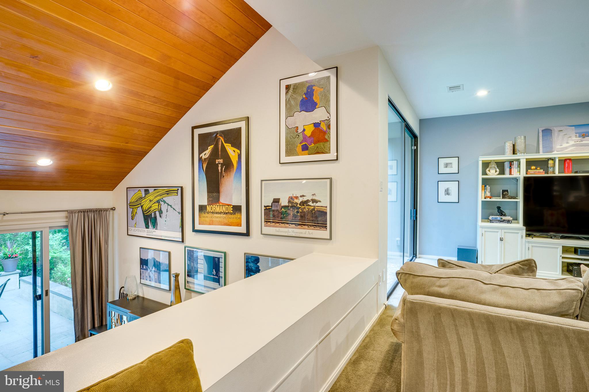 11405 Purple Beech Drive Reston, VA 20191 - Photo 36 of 72 a view of a livingroom with a flat screen tv