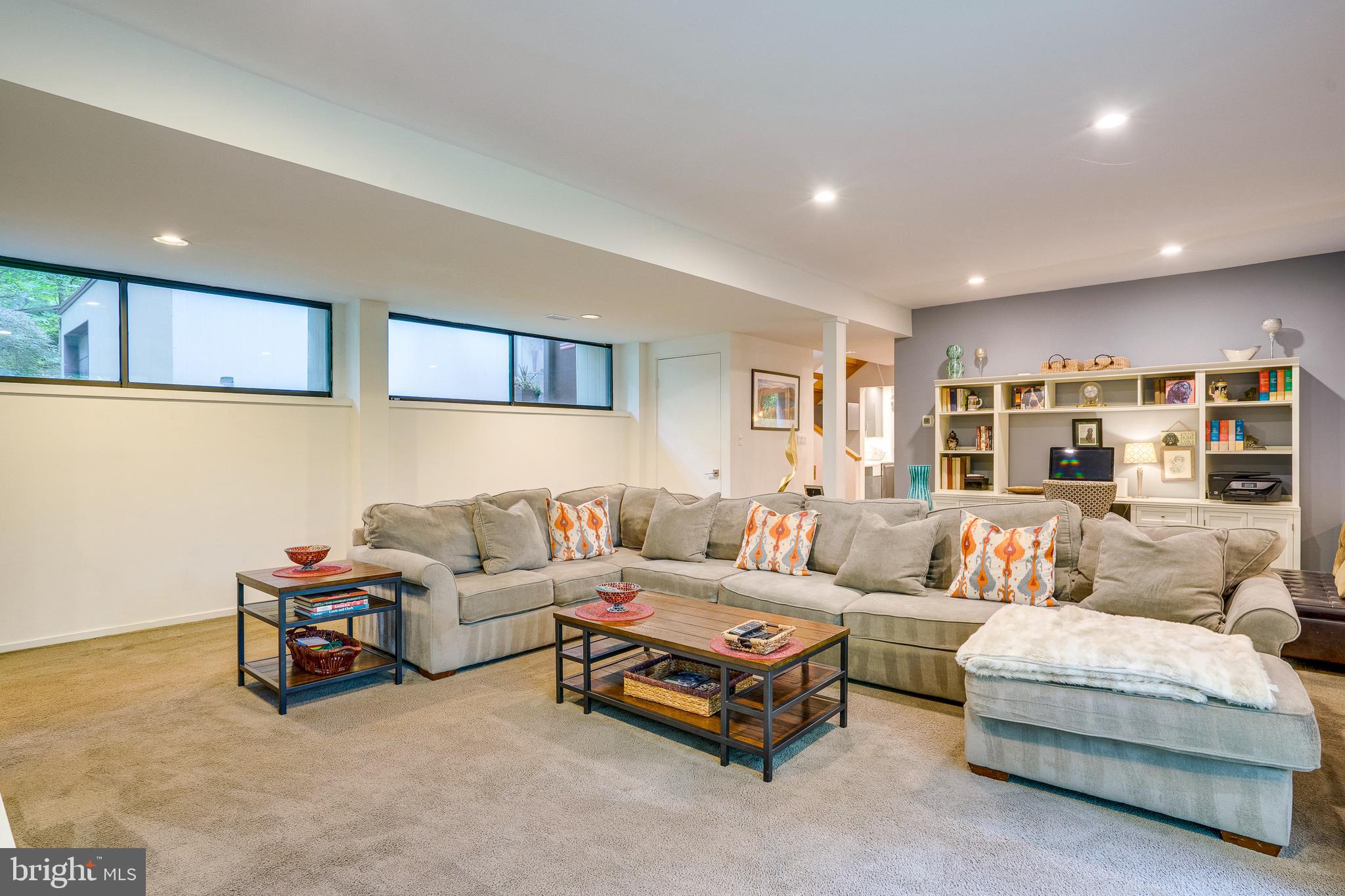 11405 Purple Beech Drive Reston, VA 20191 - Photo 38 of 72 a living room with furniture and a night stand