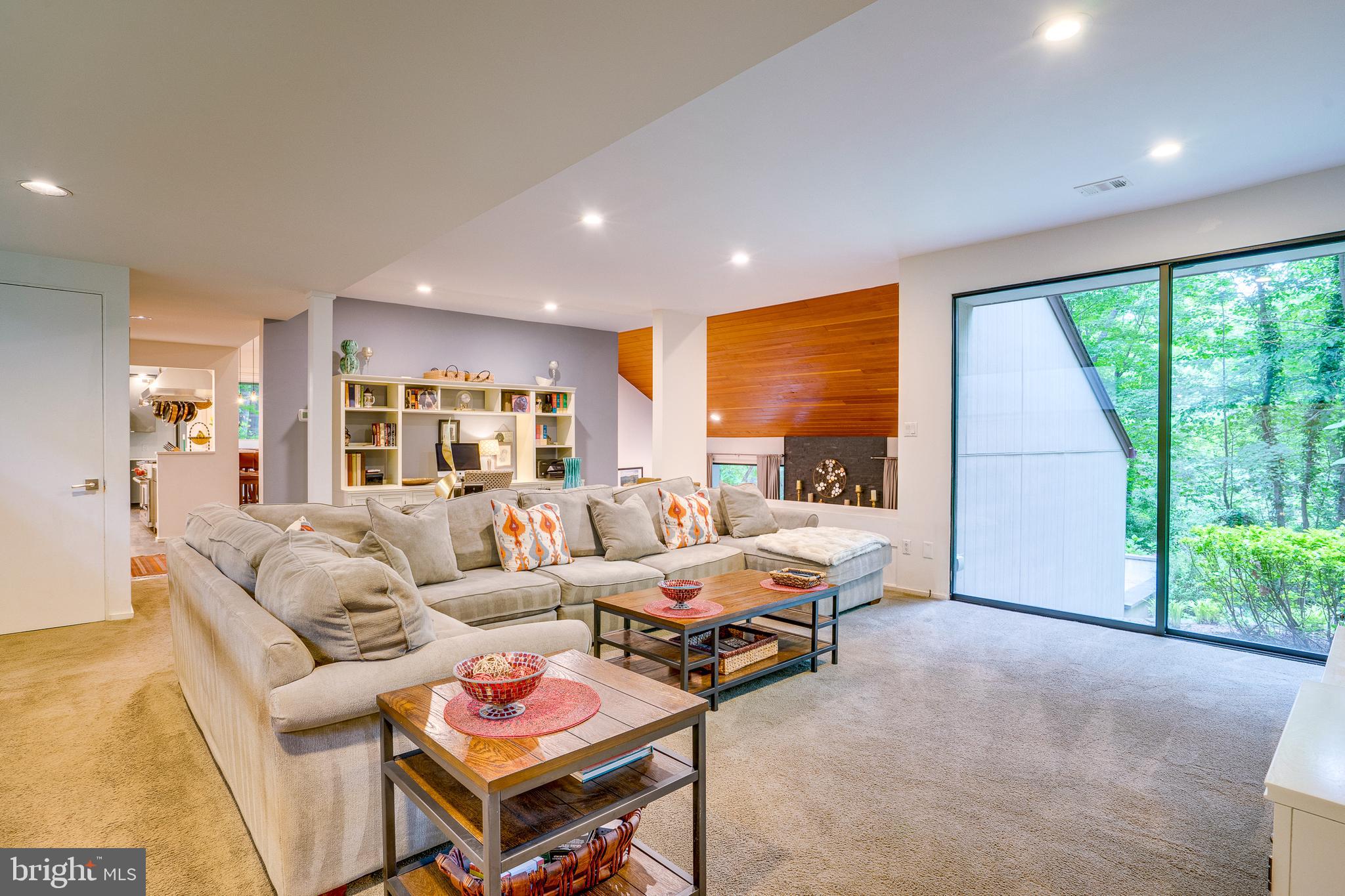11405 Purple Beech Drive Reston, VA 20191 - Photo 39 of 72 a living room with furniture and a large window