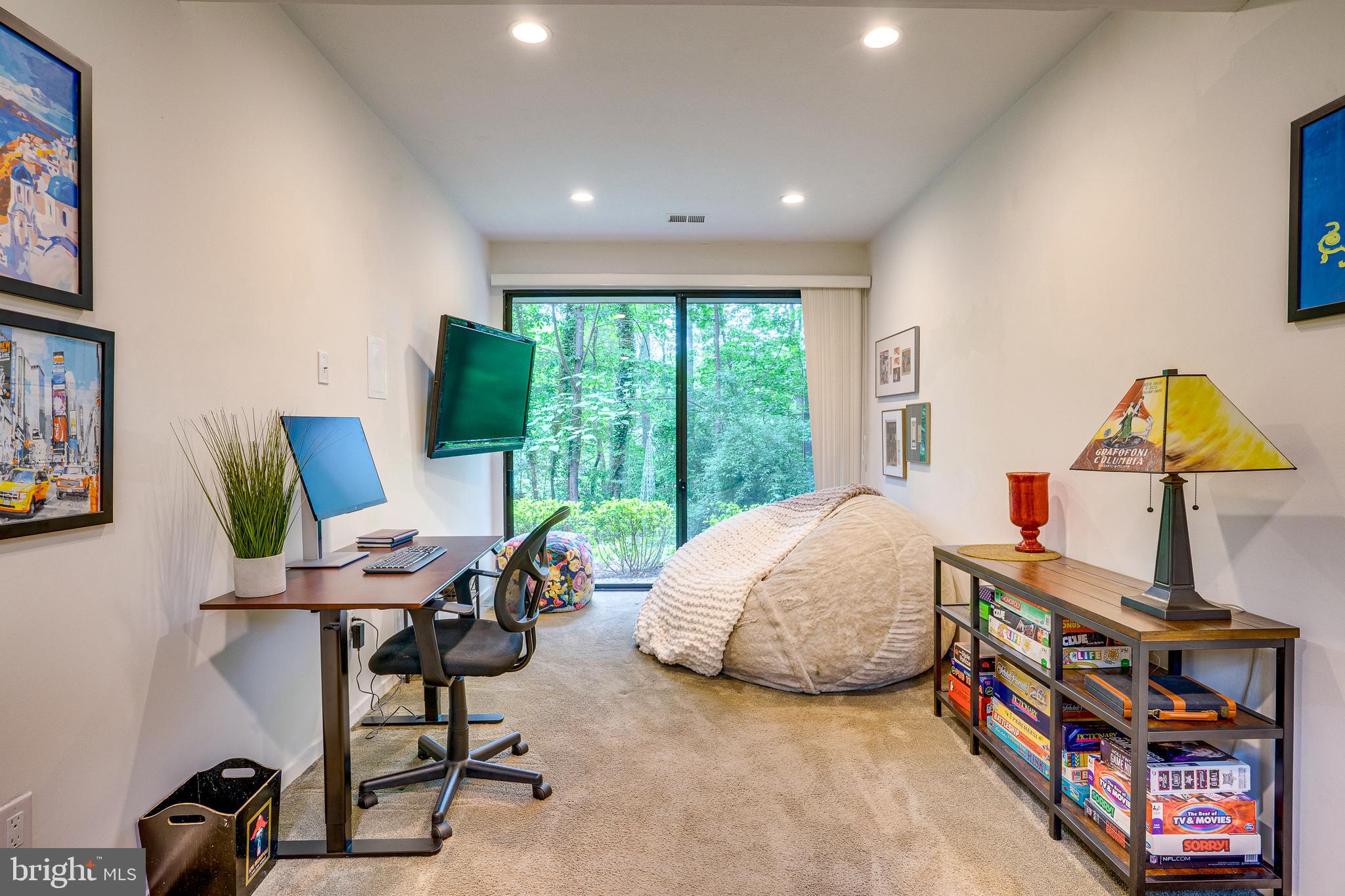 11405 Purple Beech Drive Reston, VA 20191 - Photo 41 of 72 a living room with furniture and a window