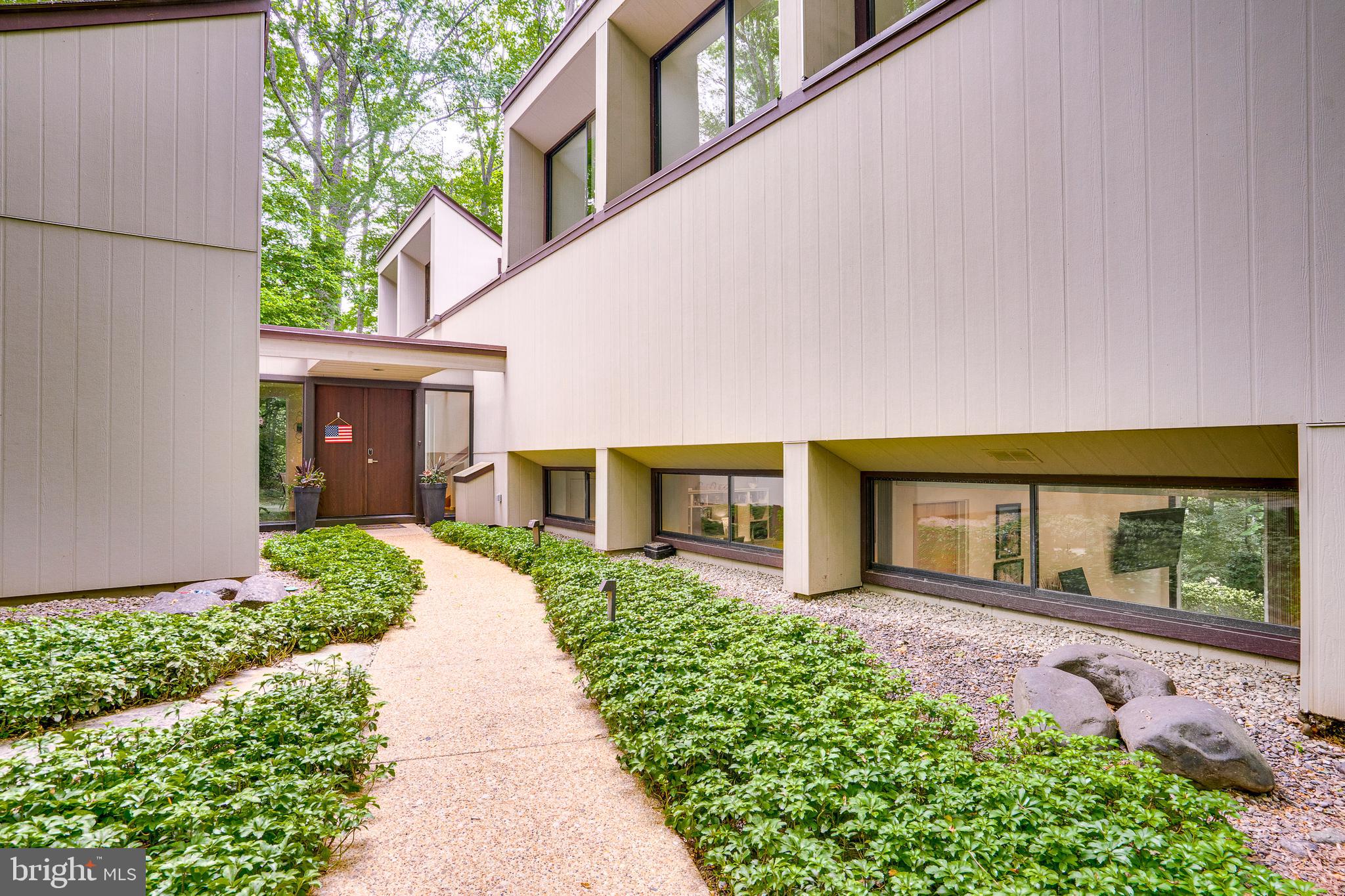 11405 Purple Beech Drive Reston, VA 20191 - Photo 5 of 72 front view of a house with a yard