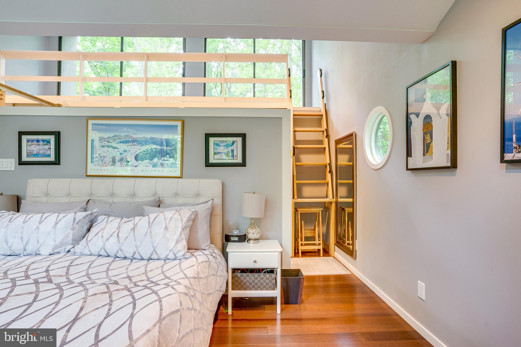 11405 Purple Beech Drive Reston, VA 20191 - Photo 58 of 72 a bed room with a bed and a window