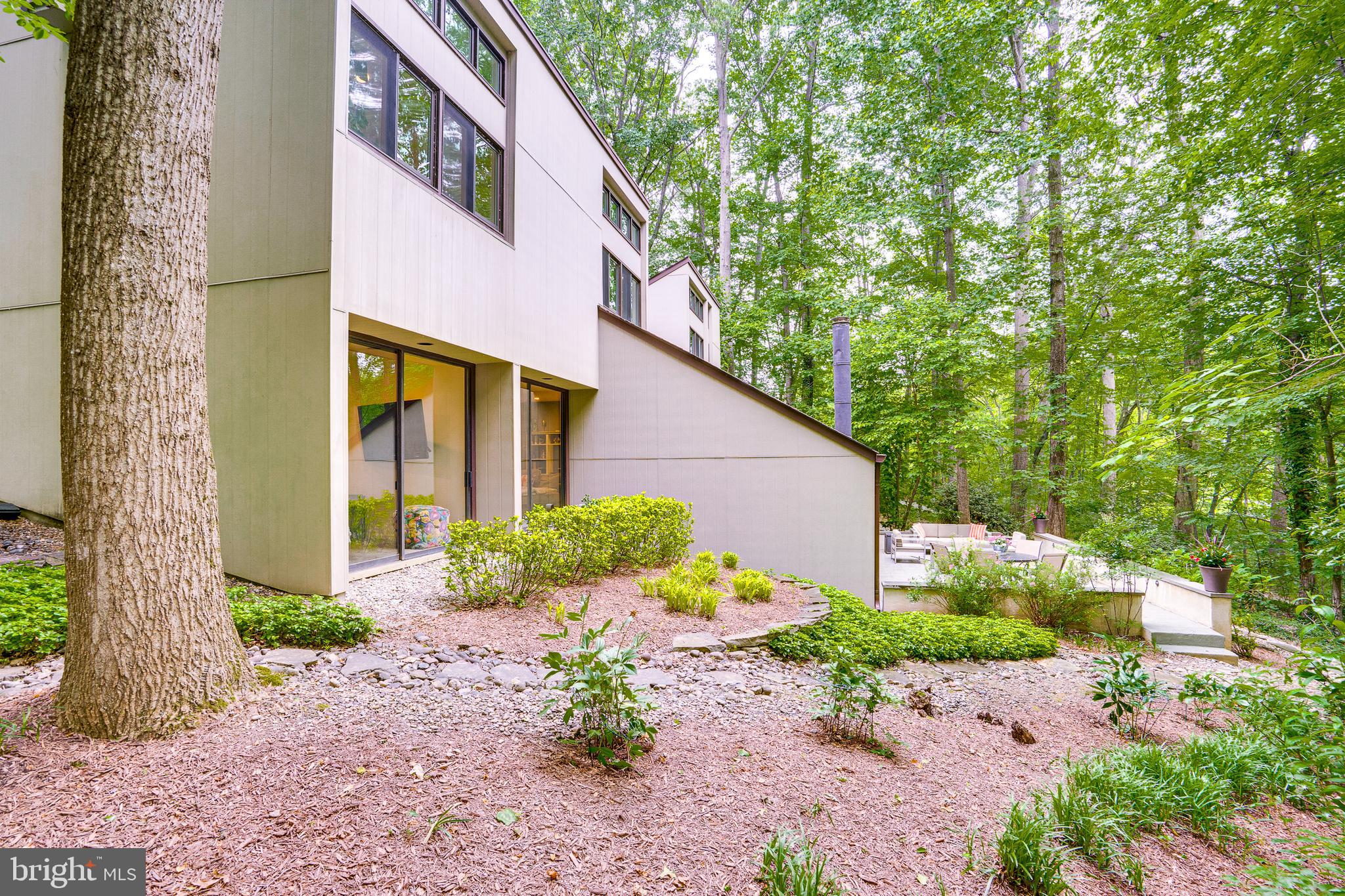 11405 Purple Beech Drive Reston, VA 20191 - Photo 64 of 72 a front view of a house with garden
