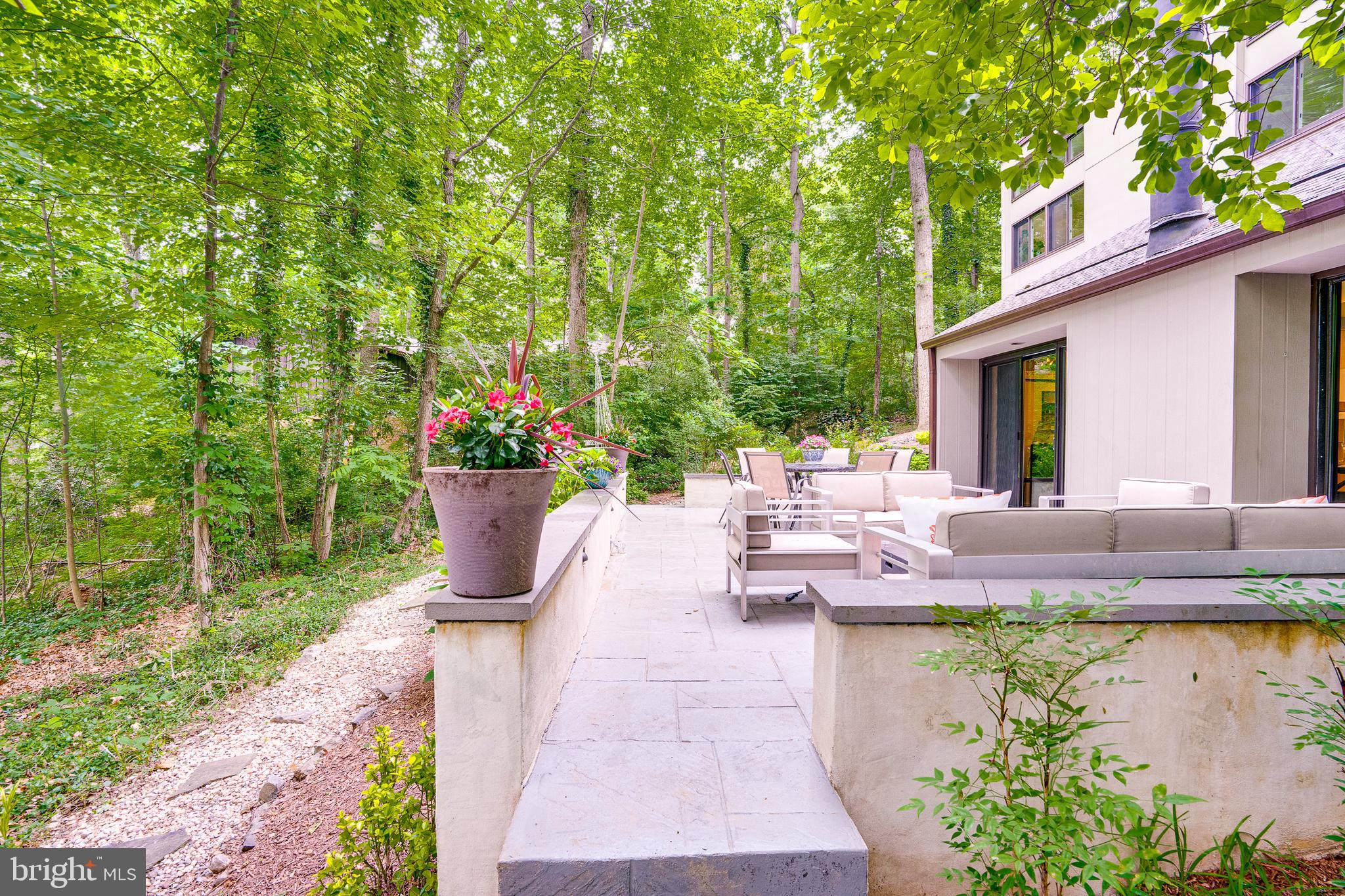 11405 Purple Beech Drive Reston, VA 20191 - Photo 67 of 72 a view of a patio with chairs and plants