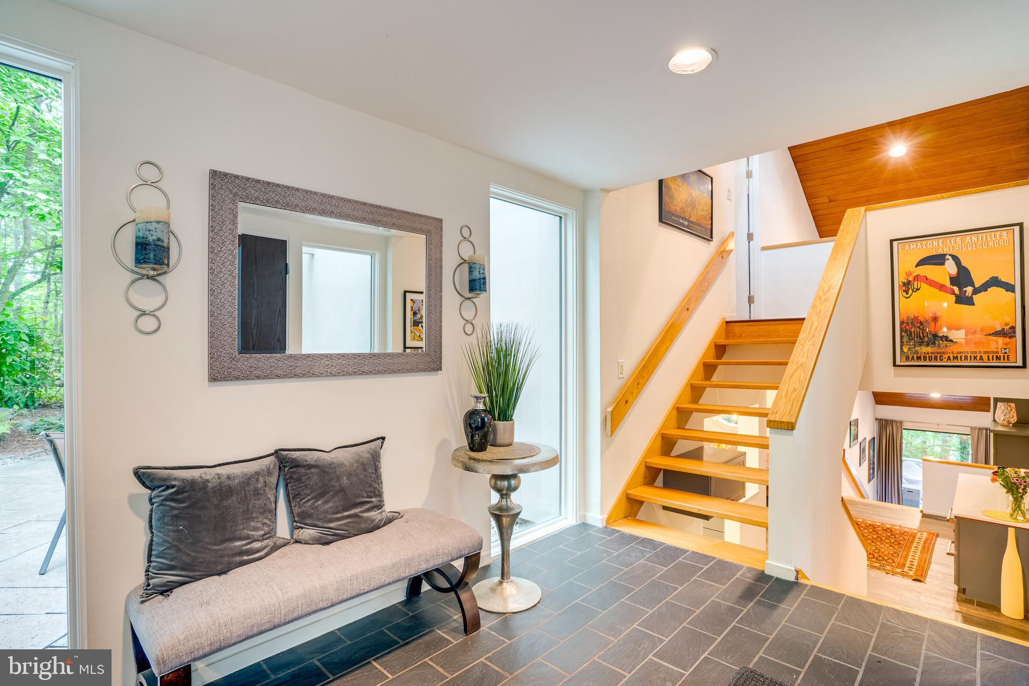 11405 Purple Beech Drive Reston, VA 20191 - Photo 8 of 72 a living room with furniture and a fireplace