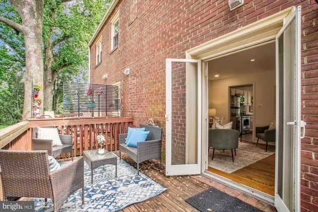 a view of balcony with patio