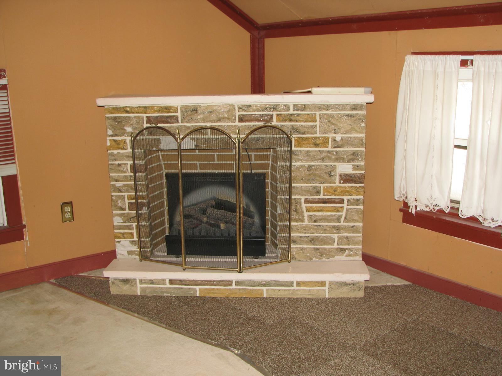 1310 South Cocalico Road Denver, PA 17517 - Photo 39 of 57 BEDROOM - 2 - DECORATIVE ELECTRIC FIREPLACE