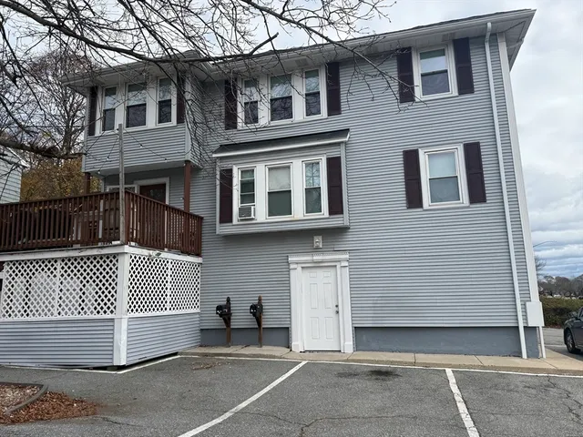 a front view of a house with a garage