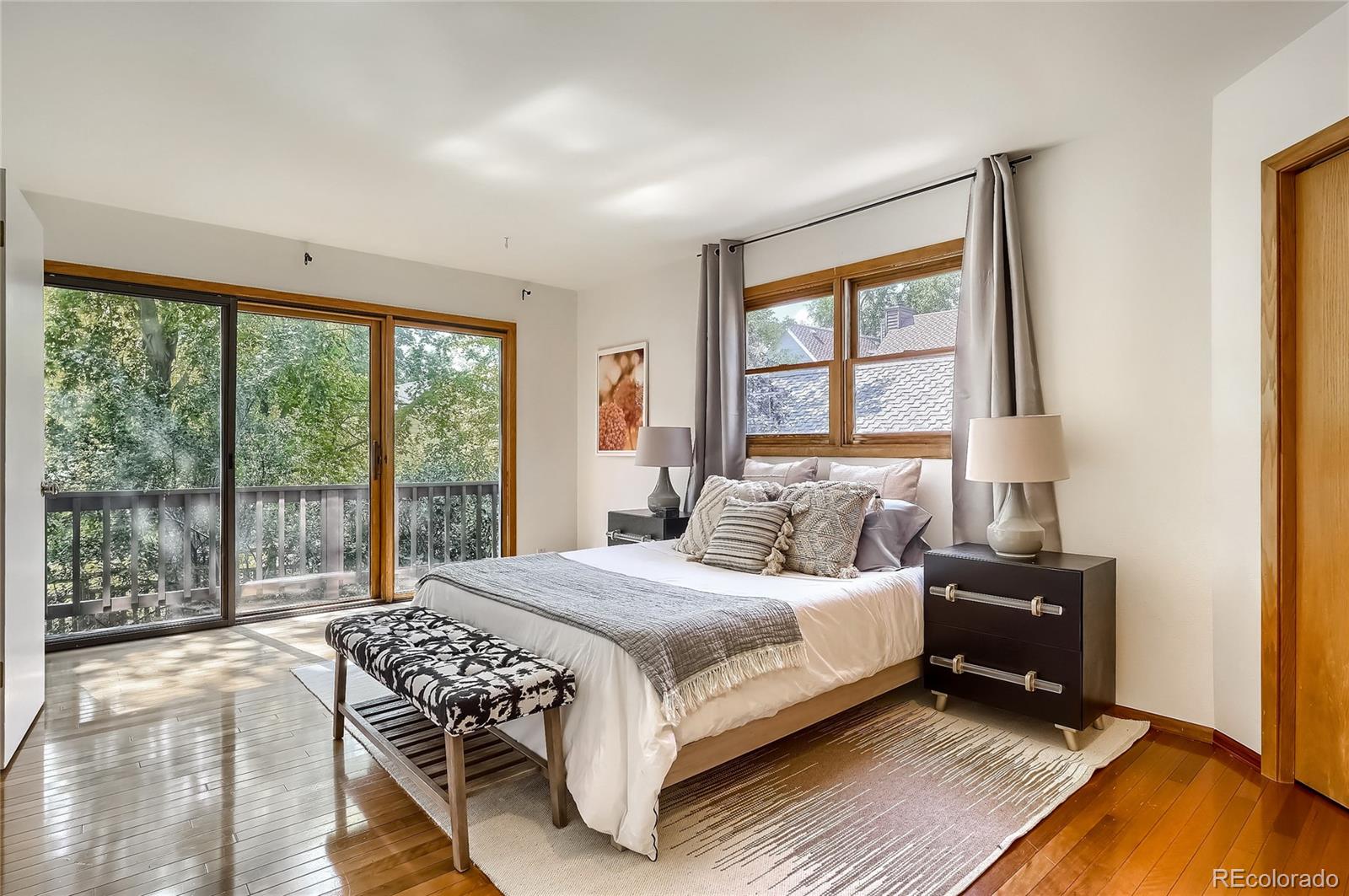 4150 Riverside Avenue Boulder, CO 80304 - Photo 11 of 35 a bedroom with a bed and a large window