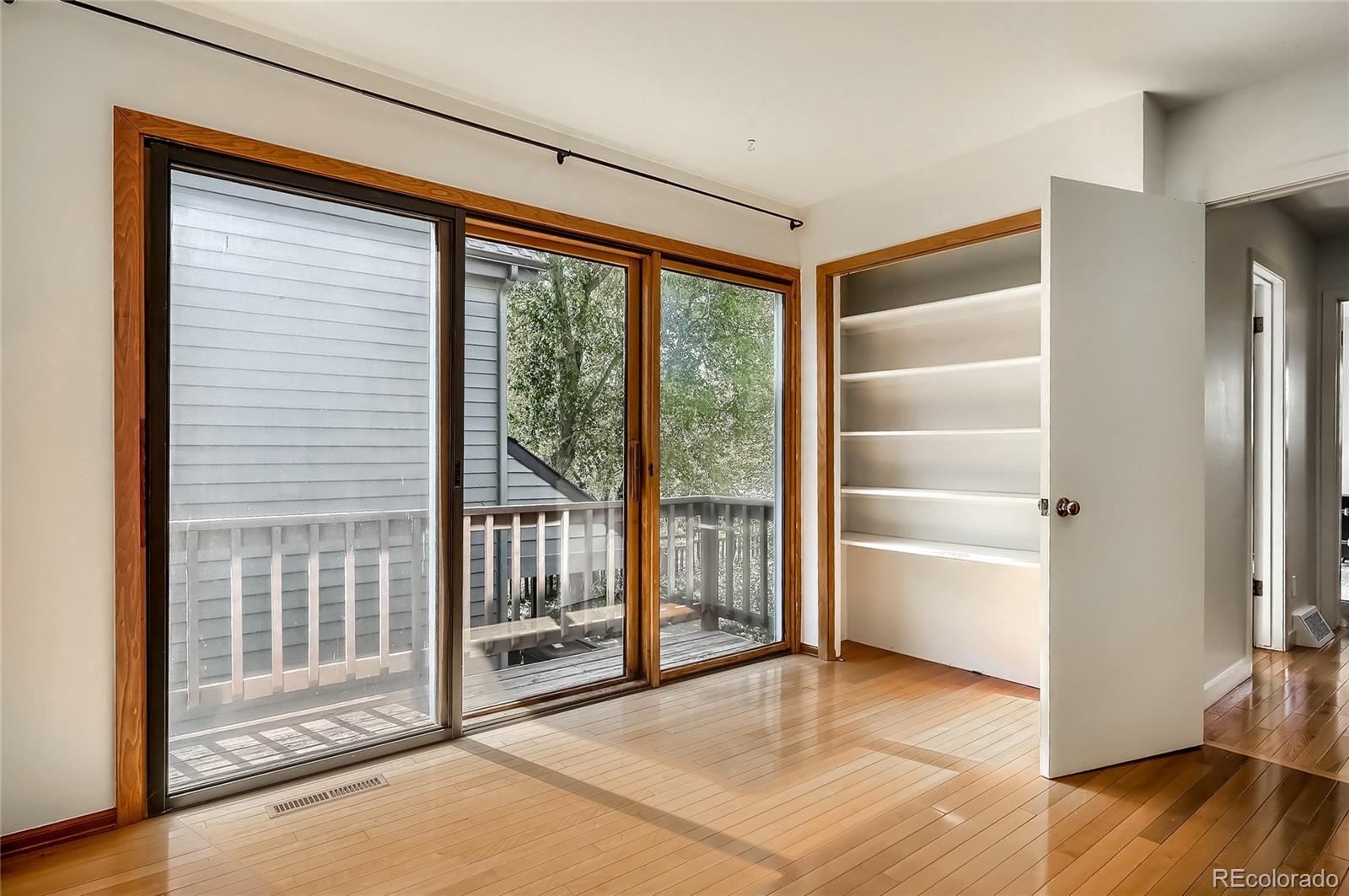4150 Riverside Avenue Boulder, CO 80304 - Photo 16 of 35 a view of empty room with wooden floor and fan
