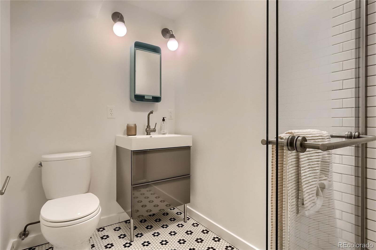 4150 Riverside Avenue Boulder, CO 80304 - Photo 22 of 35 a bathroom with a sink toilet and shower