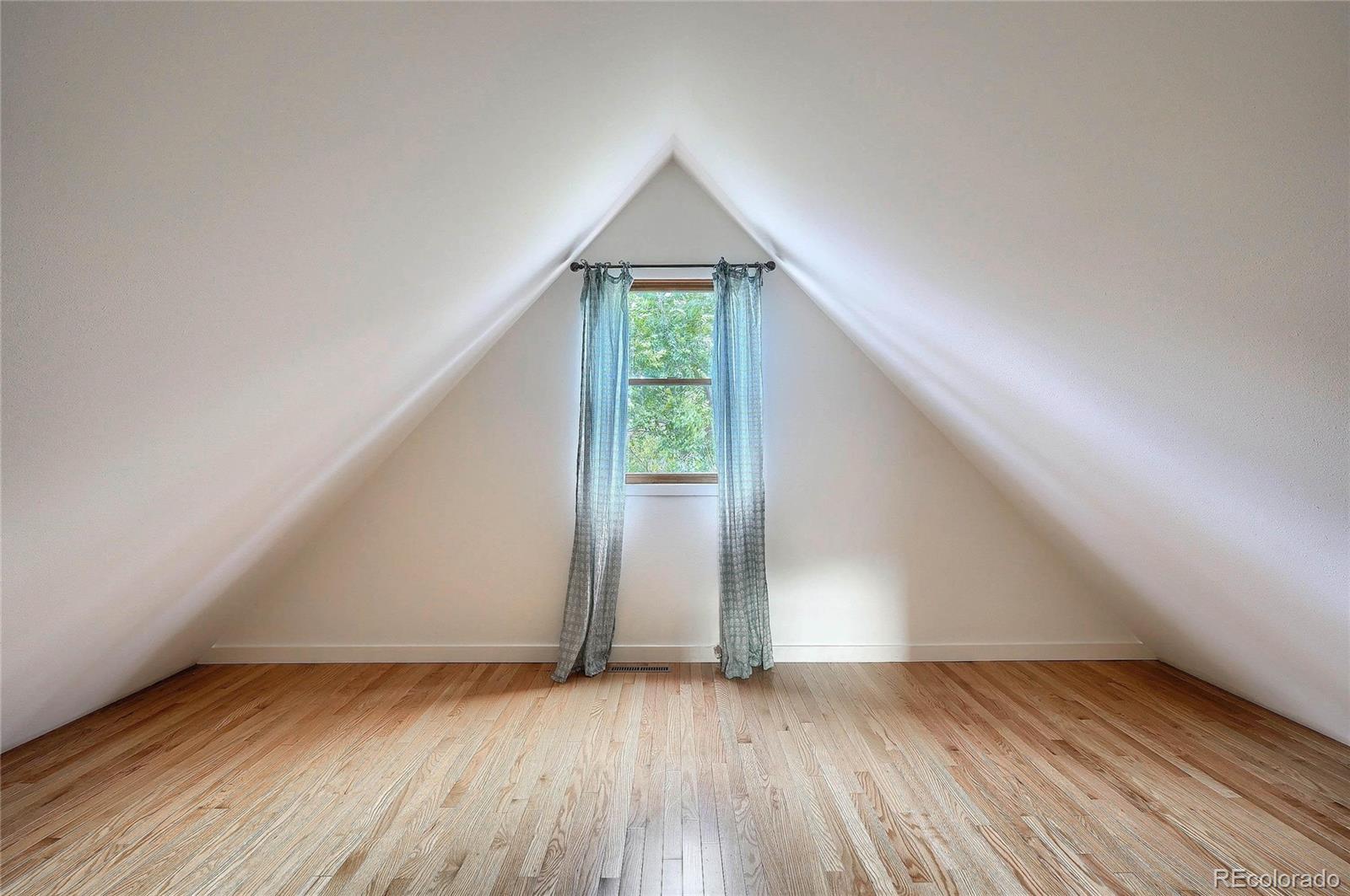 4150 Riverside Avenue Boulder, CO 80304 - Photo 28 of 35 an empty room with wooden floor and windows