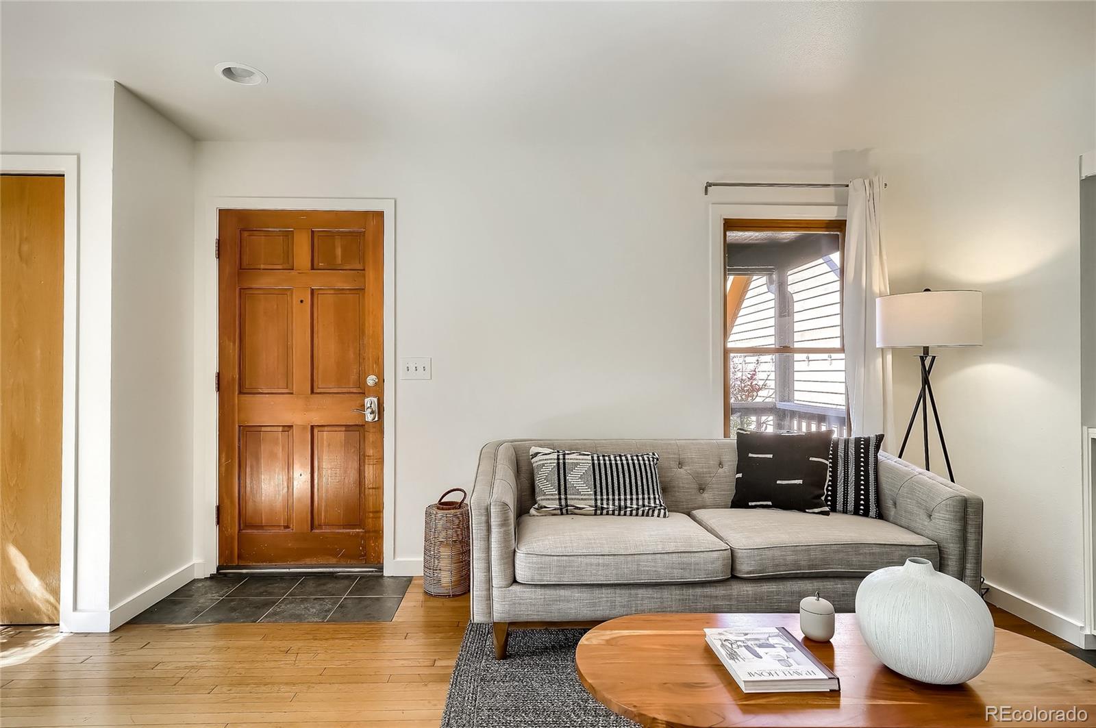 4150 Riverside Avenue Boulder, CO 80304 - Photo 4 of 35 a living room with furniture and a window