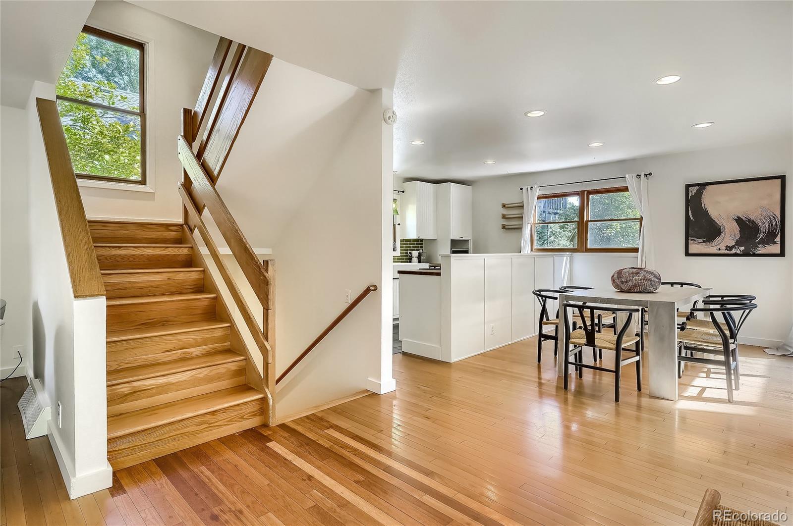 4150 Riverside Avenue Boulder, CO 80304 - Photo 5 of 35 a view of a dining room with furniture window and wooden floor