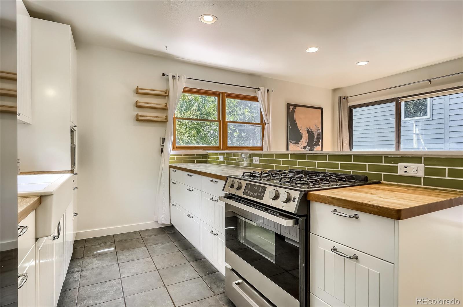 4150 Riverside Avenue Boulder, CO 80304 - Photo 10 of 35 a kitchen with a stove and a sink