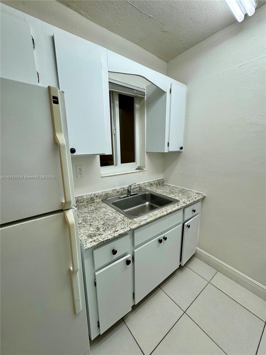 4080 Southwest 2nd Terrace, Unit 2 Miami, FL 33134 - Photo 11 of 19 a utility room with washer and dryer