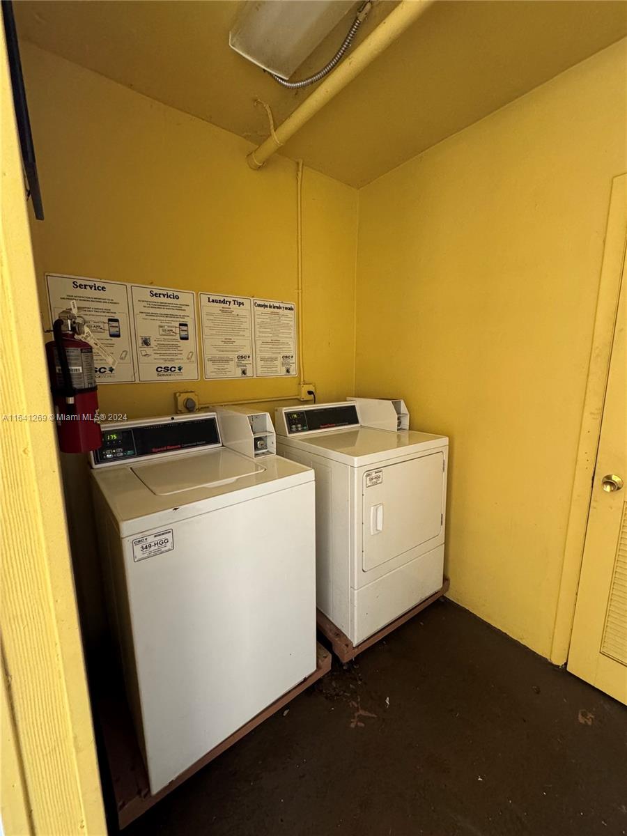 4080 Southwest 2nd Terrace, Unit 2 Miami, FL 33134 - Photo 16 of 19 a utility room with dryer and washer