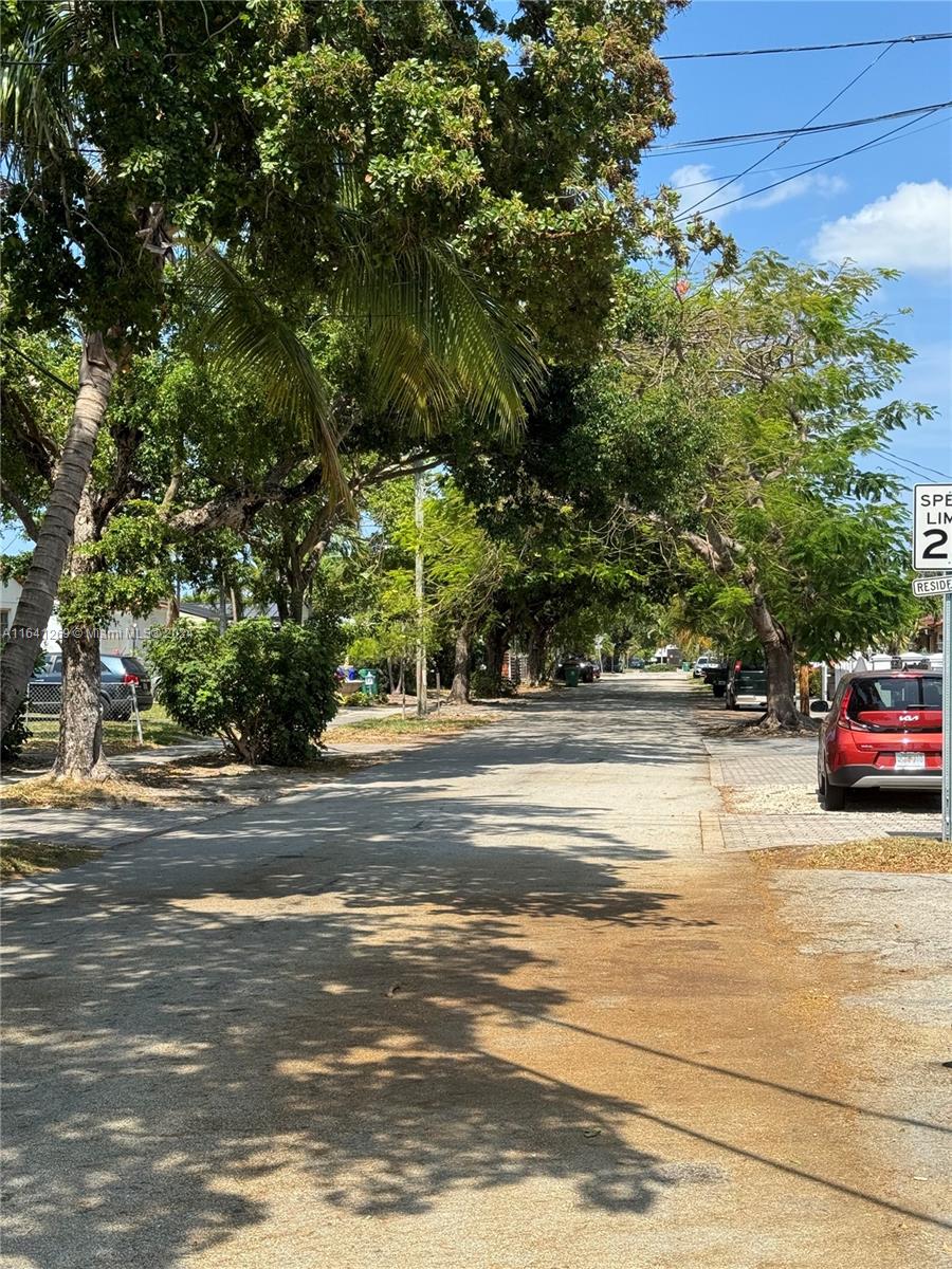 4080 Southwest 2nd Terrace, Unit 2 Miami, FL 33134 - Photo 18 of 19 a view of street with parked cars