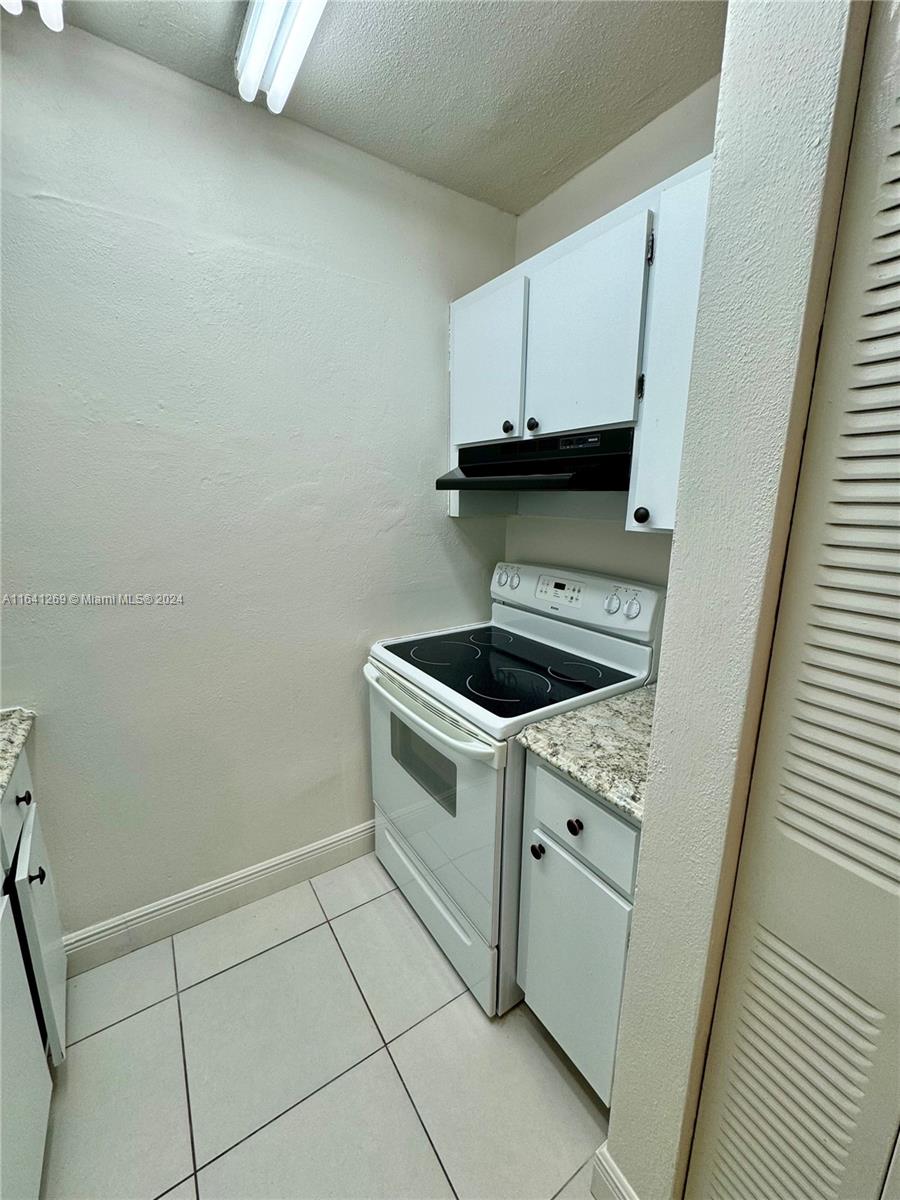 4080 Southwest 2nd Terrace, Unit 2 Miami, FL 33134 - Photo 10 of 19 a utility room with dryer and washer