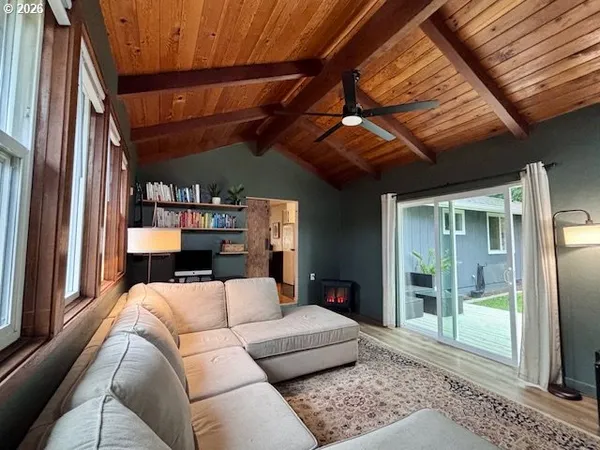 a view of a livingroom with furniture and a couch