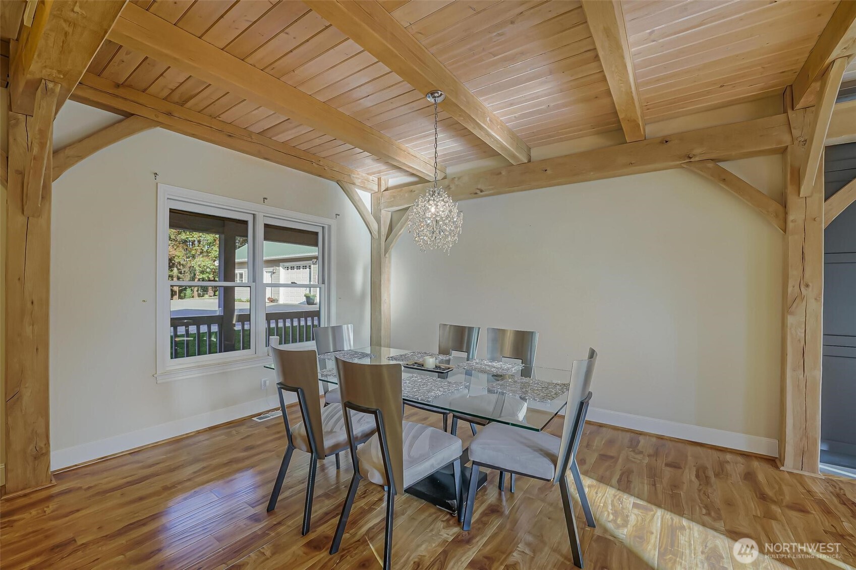528 Waynes Ridge Circle Camano Island, WA 98282 - Photo 11 of 40 a view of a dining room with furniture and wooden floor