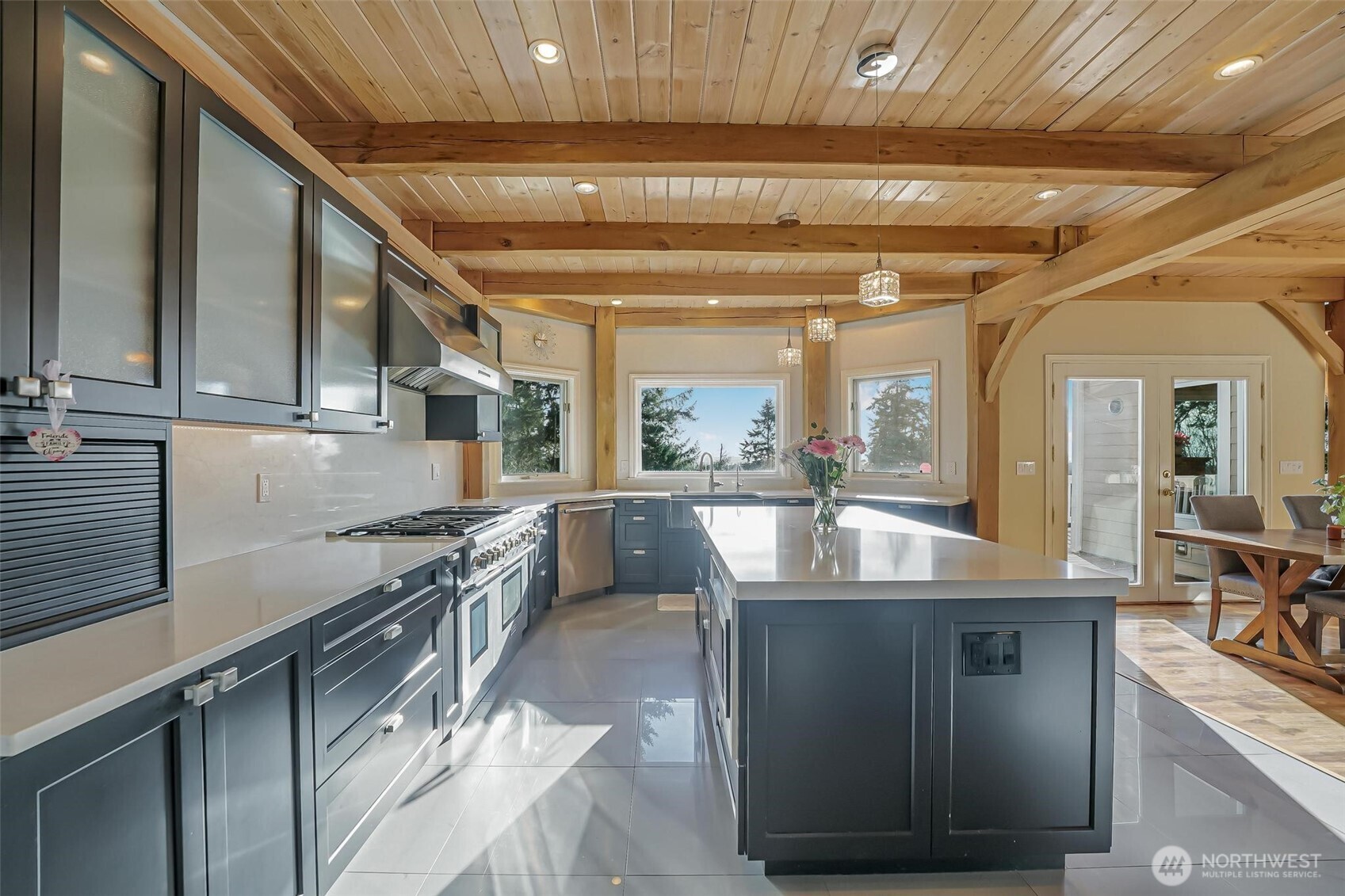 528 Waynes Ridge Circle Camano Island, WA 98282 - Photo 13 of 40 a kitchen with kitchen island granite countertop lots of counter top space