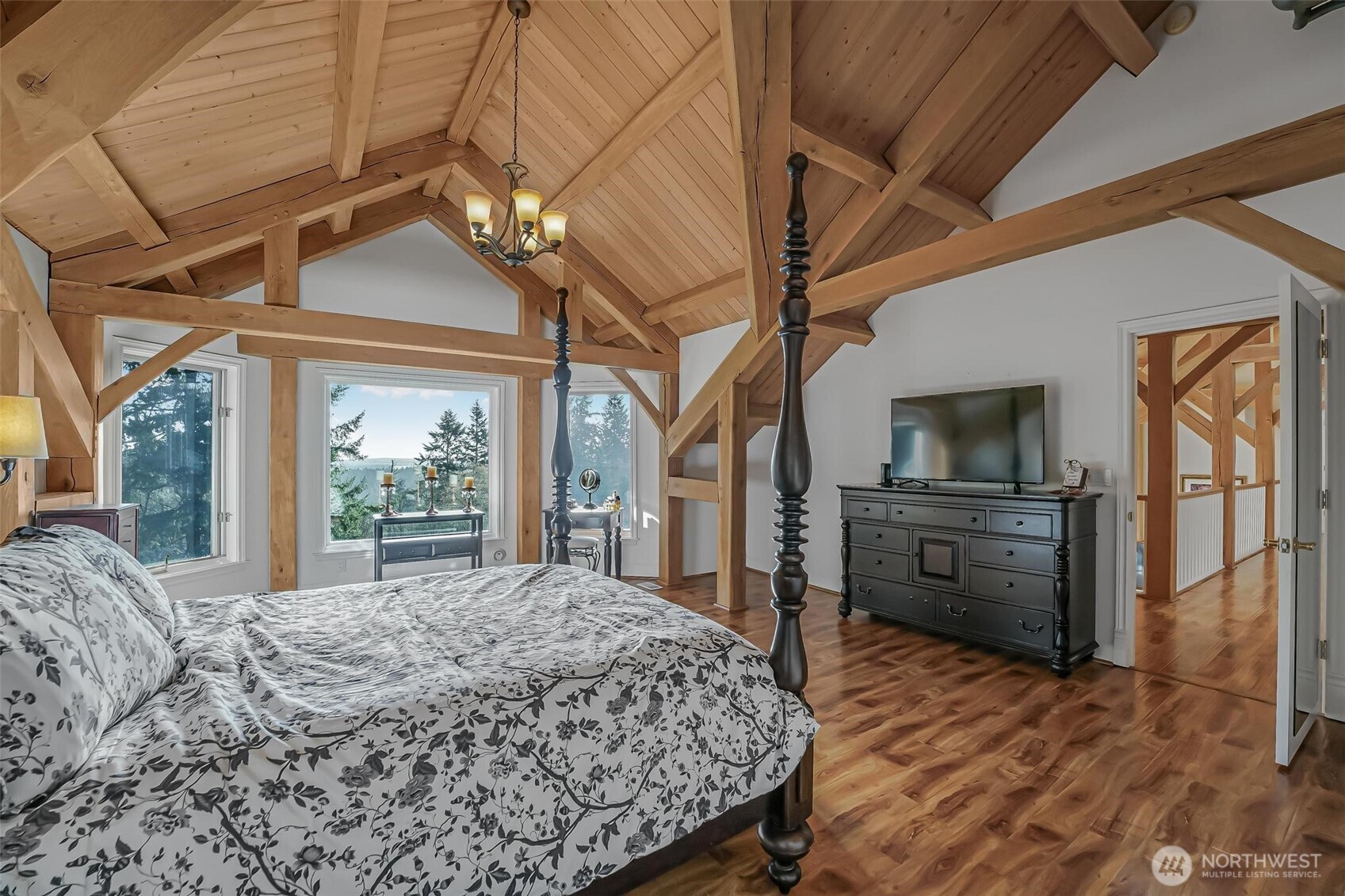 528 Waynes Ridge Circle Camano Island, WA 98282 - Photo 21 of 40 a bed sitting in a spacious bedroom next to a window