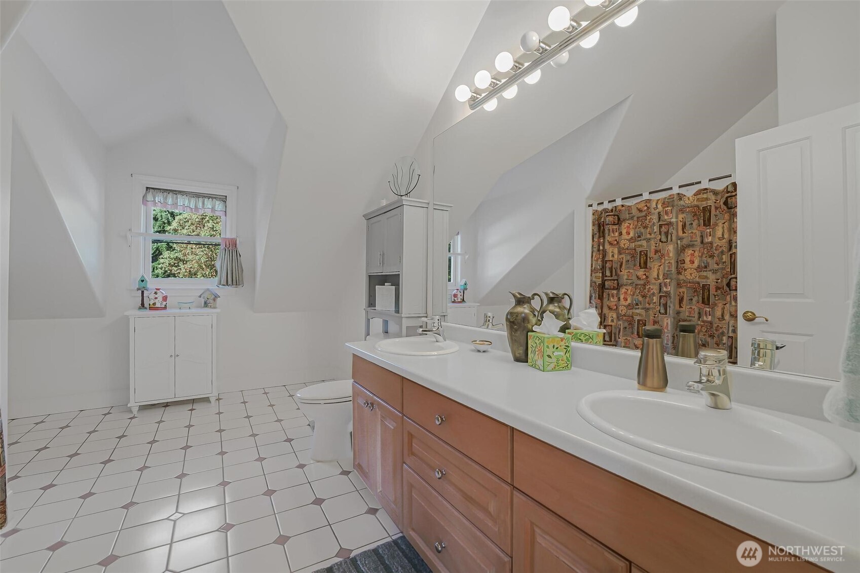 528 Waynes Ridge Circle Camano Island, WA 98282 - Photo 25 of 40 a bathroom with a sink a vanity a mirror and a shower