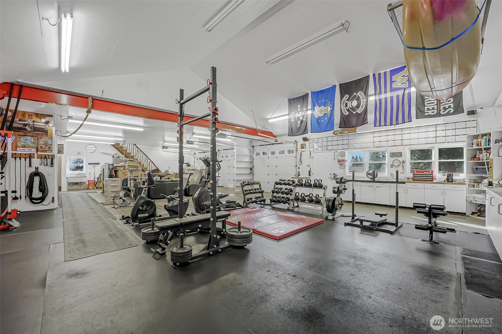 528 Waynes Ridge Circle Camano Island, WA 98282 - Photo 37 of 40 a room with gym equipment and a view of living room