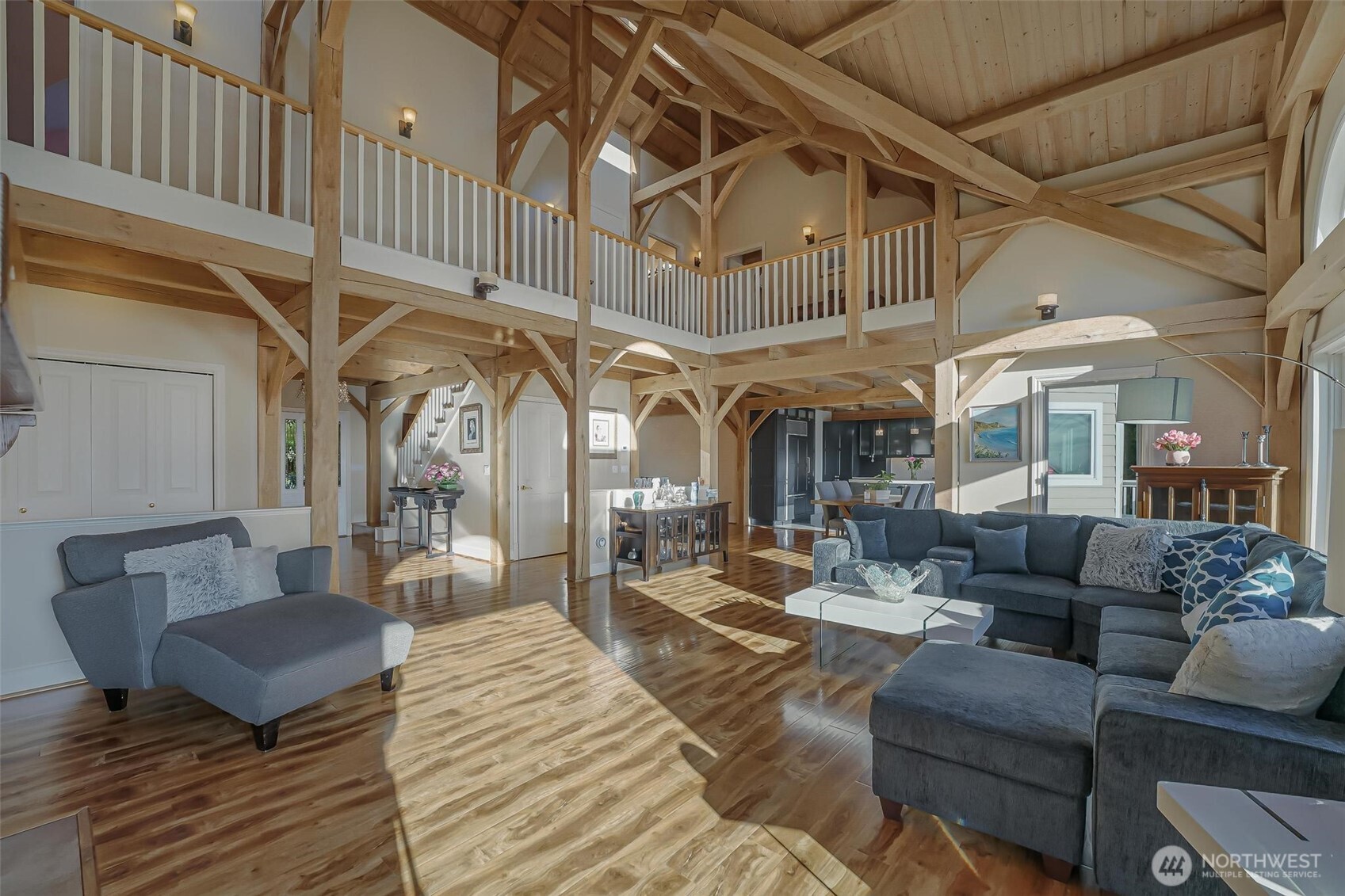 528 Waynes Ridge Circle Camano Island, WA 98282 - Photo 7 of 40 a living room with furniture a fireplace and a rug