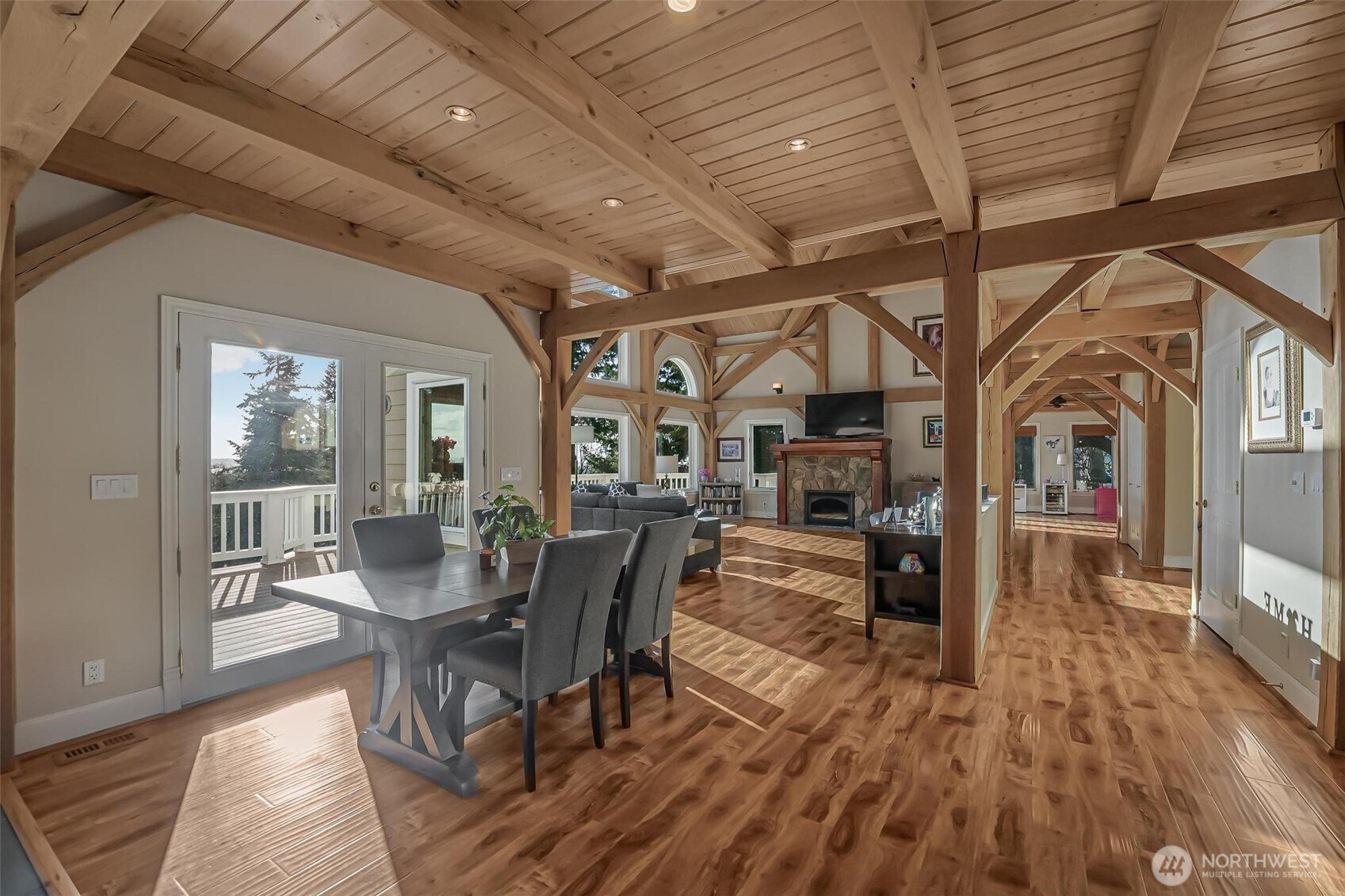 528 Waynes Ridge Circle Camano Island, WA 98282 - Photo 10 of 40 a view of a dining room with furniture window and wooden floor