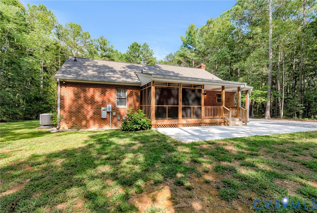 15321 Goshen Road Montpelier, VA 23192 - Photo 31 of 36 Brick exterior featuring a screened porch, open de