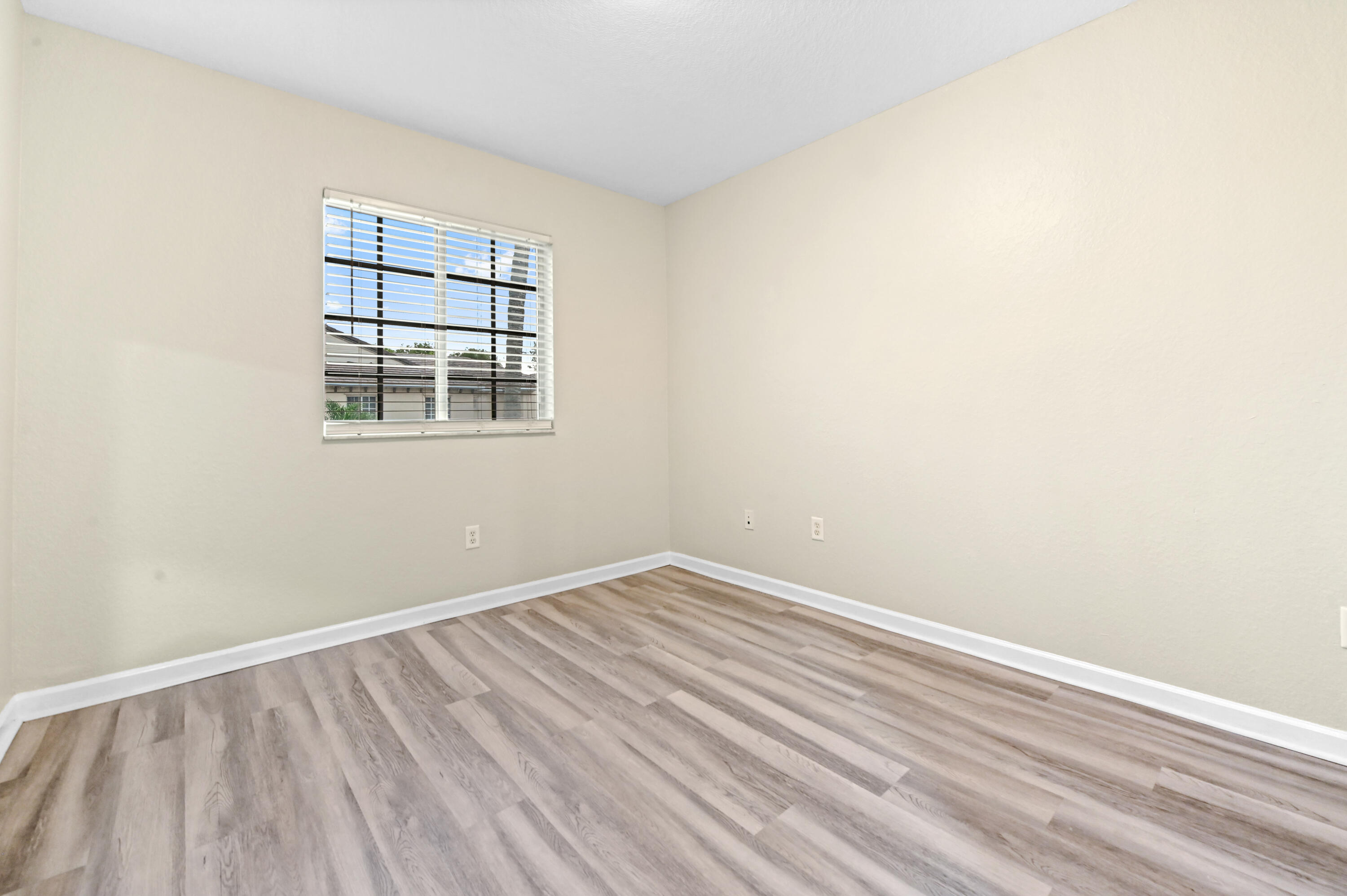 975 Tortuga Drive Riviera Beach, FL 33404 - Photo 16 of 29 an empty room with a window
